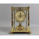 A Mid 20th Century Brass and Four Glass Pillar Clock, German Movement, 16cms High