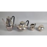 An American Polished Stainless Steel Four Piece Tea Set by John Prip for Reed & Barton with Fish