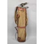 A Set of Vintage Golf Clubs in Canvas Bag