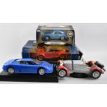 A Collection of Four Large Diecast Model Cars, Bugatti, Porsche Etc
