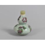 A Chinese Double Gourd Snuff Bottle with Floral Decoration, 6cms High