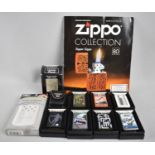 A Collection of Six DeAgostini Zippo Collection Lighters with Boxes, Zippo Hand Warmer and a Zippo