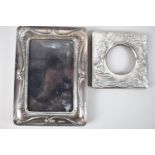 A Rectangular Silver Easel Back Photo Frame, 18cm x 13cm Together with a Smaller Example Decorated