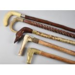 A Collection of Five Mid 20th Century Walking Sticks