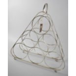 A Mid 20th Century Six Bottle Silver Plated Wine Rack with Loop Handle