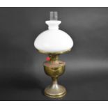 A Vintage Brass Oil Lamp with Glass Shade