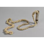 A Vintage Metropolitan Police Whistle on Rope Lanyard