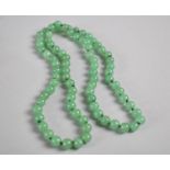 A String of Jadeite Effect Beads