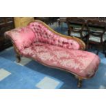 A Late Victorian Mahogany Framed Button Upholstered Chaise Longue with Four Carved Cabriole
