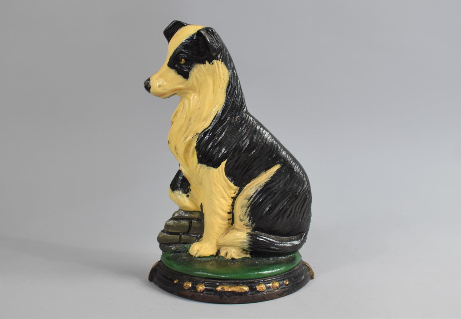 A Modern Painted Cased Iron Doorstop in the Form of Seated Sheepdog by Minster, 25cm high