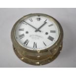 A Vintage Circular Brass Cased Bulkhead Clock with White Enamelled Dial by Whyte Thomson and Co,