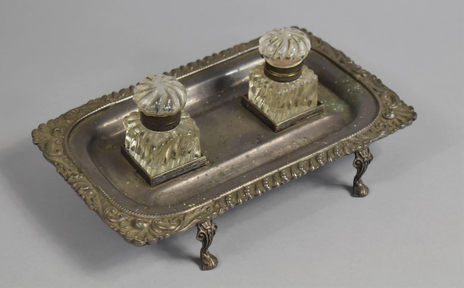 A Late 19th/Early 20th Century Silver Plated Pen and Ink Desktop Tray on Four Scrolled Feet, Two Ink