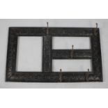 An Edwardian Ebonised Wooden Coat Rack, 92cm wide