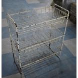 A Vintage White Painted Three Tier Wire Rack