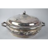 An American Reed & Barton Circular Plated Two Handled Tureen with Lid, Decorated in Relief with