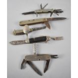 A Collection of Five Multitool Knives including Girl Guides