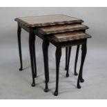 A Mid 20th Century Nest of Three Mahogany Framed Tables with Tooled Leather Tops, 54cms Wide