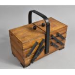 A Mid 20th Century Cantilevered Sewing Box Containing Cotton Thread and Other Sewing Accessories (