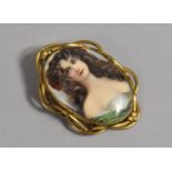 A Hand Painted Porcelain Oval of a Maiden, Mounted in Gold Plated Brooch Surround, 6.25cms Long