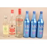 Three Bottles of Vodka Blue Mix, One Bottle Chekov Vodka, Smirnoff Vodka and Polish Pure Spirit