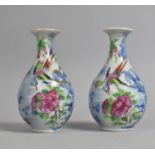 A Pair of Chinese Porcelain Famille Rose Clobberd Vases of Bottle Form, 13cm high, Condition Issues