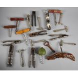 A Collection of Vintage Corkscrews, Bottle Openers, Nut Crackers and Toffee Hammers