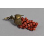 A Continental Silver Gilt and Red Coral Brooch the form of a Bunch of Grapes, Stamped 800