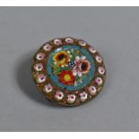 A Circular Micro Mosaic Brooch with Floral Decoration