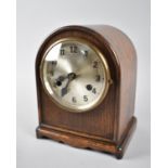 An Edwardian Dome Topped Oak Mantel Clock, 17cms Wide
