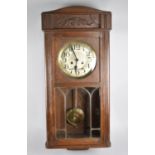An Edwardian Oak Wall Clock, 81cms High
