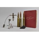 A Collection of WWII and Later Militaria to include Three Spent Shells, Trench Art Tightrope