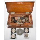 An Edwardian Oak Box Containing British and Foreign Coins and Crowns, Victoria Coronation
