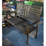 A Wooden Slatted Garden Bench, Weathered Condition, 110cms Wide