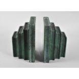 A Pair of Faux Malachite Bookends in the Form of Four Graduated Books, 13cms High