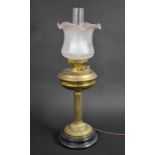 A Brass Table Lamp in the Form of a Victorian Oil Lamp with Ribbed Column Support, 62cms High