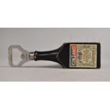 An Advertising Bottle Opener and Brush for Cinzano Vermouth, 15.5cm Long