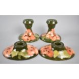Two Pairs of Moorcroft Coral Hibiscus Squat Candlesticks