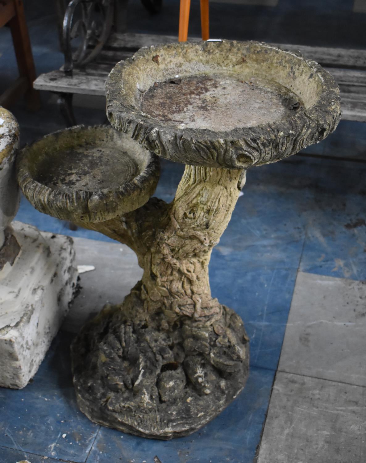 A Reconstituted Stone Two Tier Garden Bird Bath in the Form of a Tree Stump, 64cms Tall