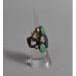 A Ladies Dress Ring Set with Nine Polished Paste Stones and Enamel