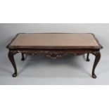 A Modern Mahogany Framed Rectangular Coffee Table with Tooled Leather Top, 107cms Long