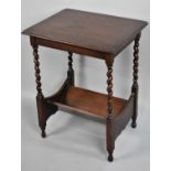 A Mid 20th century Oak Barley Twist Book Rack and Reading Table, 52cms Wide