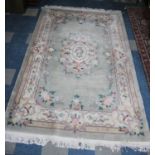 A Chinese Patterned Woollen Rug, 282x181cms