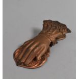 An Early 20th century Pressed Metal Letter Clip in the Form of a Ladies Gloved Hand. 14cms Long