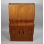 A 1970s Teak Hall Bureau, Fall Front, Centre Drawer and Cupboard Base, 61cms Wide