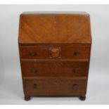 A Mid 20th Century Oak Fall Front Bureau with Three Drawers, 76cms Wide