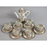 A Coalport Indian Tree coffee set comprising of 6 cans and saucers and coffee pot.