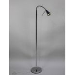 A Modern Chromed Adjustable Reading Lamp with Foot Pedal On/Off Switch