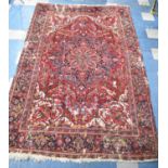 A Large Antique Persian Heriz Rug on Red Ground, Some Wear and Condition Issues, 340x240cms