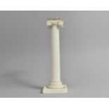 A 19th Century Glazed Candle Stick in the Form of a Classical Reed Column with Ionic Capital,