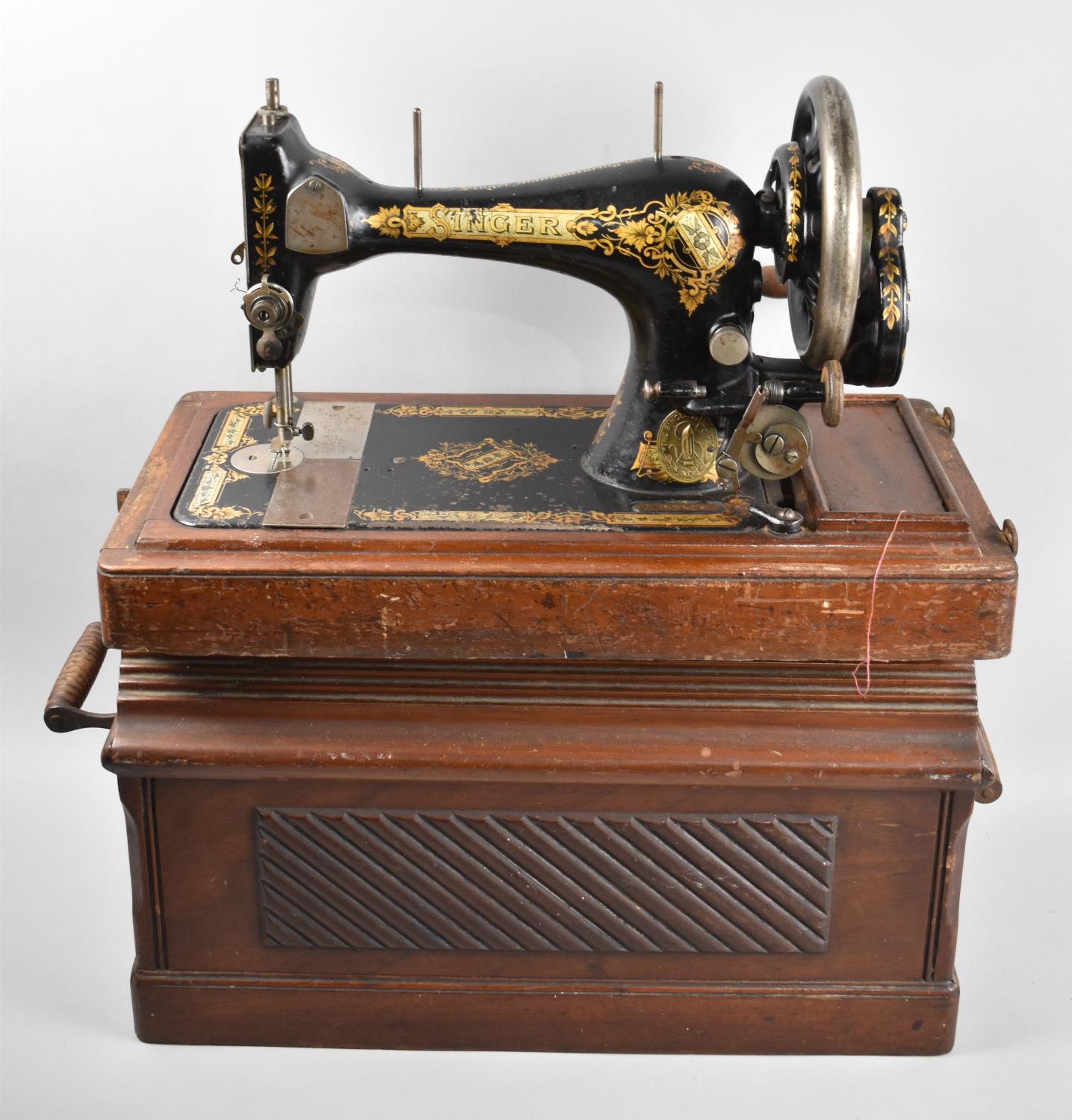 A Vintage Cased Manual Singer Sewing Machine